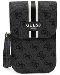 Guess - Monogram-Print Striped Phone Bag - Lyst