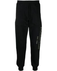 McQueen - Katoenen Trainingsbroek Met Graffiti-Print - Lyst