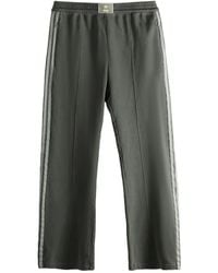 adidas - Pantalones de chándal con detalle a rayas - Lyst