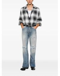 Amiri - Distressed Faded Jeans - Lyst