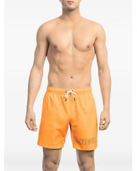 Bikkembergs - Stowable Logo-Print Drawstring Swim Shorts - Lyst