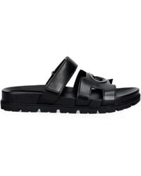 Guess - Fashien Logo-Embossed Touch-Strap Sandals - Lyst