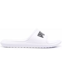 puma white flip flops mens