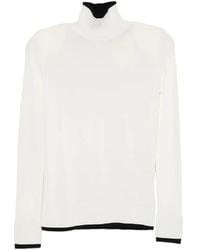 TOTEME - Ribbed-Knit Turtleneck Sweater - Lyst