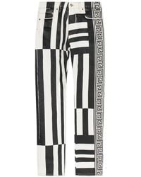 Versace - Jeans With Stripe Pattern - Lyst