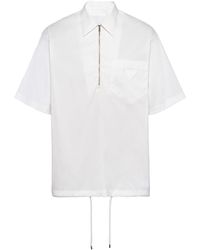Prada - Logo-appliqué Half-zip Cotton Shirt - Lyst
