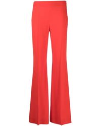 Moschino - Pressed-Crease Flared Trousers - Lyst