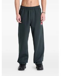 Nike - Fleece Tie-Hem Track Pants - Lyst