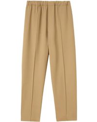 Jil Sander - Pantalones ajustados con cinturilla elástica - Lyst