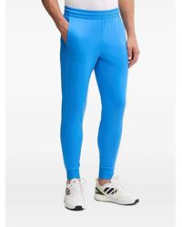 Under Armour - Logo-Detail Track Pants - Lyst