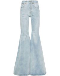Vetements - Logo-embroidered Cotton Flared Jeans - Lyst