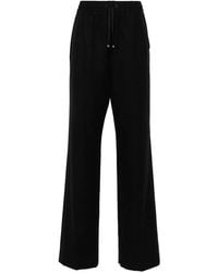 Moncler - Logo-Appliqué Felted Straight Trousers - Lyst