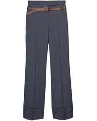 Prada - Belt-Print Trousers - Lyst