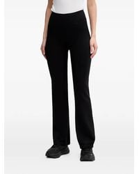 DKNY - Logo-Detail Flared Trousers - Lyst