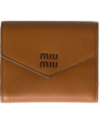 Miu Miu - Cartera con logo en relieve - Lyst