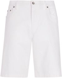 Dolce & Gabbana - Pantalones vaqueros cortos con placa del logo - Lyst