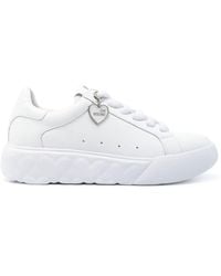 Moschino - Sneakers mit Logo-Patch - Lyst