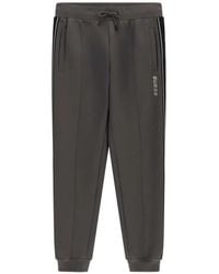 Guess - Logo Trousers - Lyst