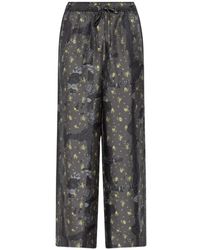 Ganni - Floral-Pattern Trousers - Lyst