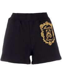 Moschino - Logo-embroidered Cotton Shorts - Lyst