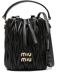 Miu Miu - Logo-lettering Matelassé Bucket Bag - Lyst