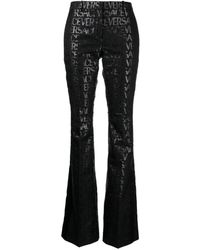 Versace - Logo-jacquard Flared-leg Trousers - Lyst
