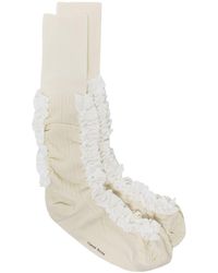 Femme Vêtements Chaussettes & Bas Chaussettes Chaussettes à lacets Simone Rocha en coloris Blanc 