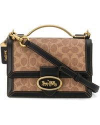 coach riley top handle 18 in signature canvas