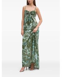 Sandro Ferrone - Vestido largo con lazo en el frente - Lyst