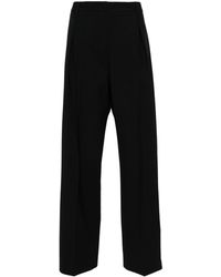 MSGM - Tapered Virgin Wool Trousers - Lyst
