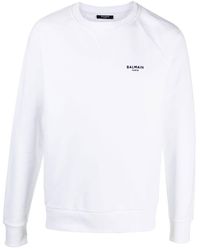 Balmain - Sweatshirt mit geflocktem Logo - Lyst