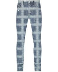 Amiri - Logo Plaid-Print Skinny Jeans - Lyst