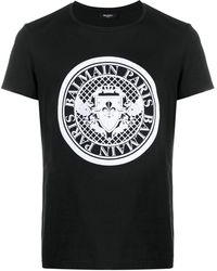 Balmain - T-Shirt mit Münz-Print - Lyst