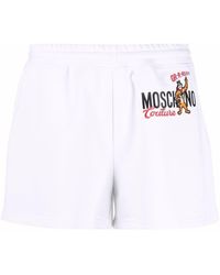 Moschino - Pantalones cortos de deporte con logo - Lyst