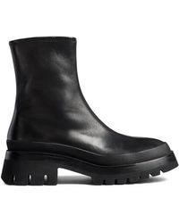 KHAITE - Fallon Boots - Lyst