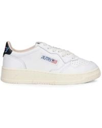 Autry - Logo-Patch Perforated Sneakers - Lyst