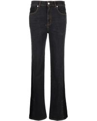 McQueen - Logo-Patch Bootcut Jeans - Lyst