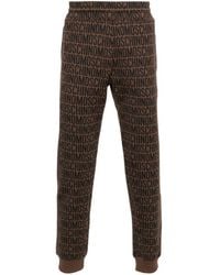 Moschino - Pantalones de chándal con logo en jacquard - Lyst