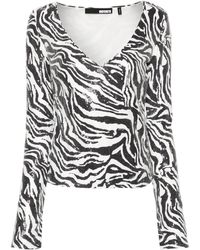 ROTATE BIRGER CHRISTENSEN - Top con estampado de cebra y lentejuelas - Lyst