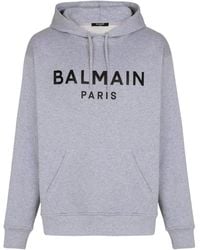 Balmain - Sudadera de algodón estampada con capucha - Lyst