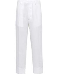 Prada - Tapered Linen Trousers - Lyst