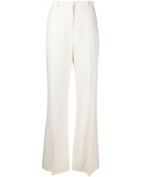 Totême - Toteme Flared Evening Trousers - Lyst