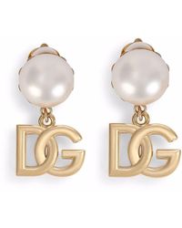Dolce & Gabbana - Orecchini a clip con logo DG - Lyst