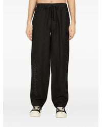 SAINTWOODS - Logo-Print Trousers - Lyst