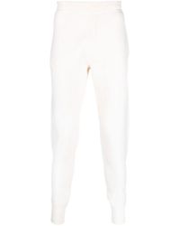 Prada - Pantalones de chándal con logo triangular - Lyst