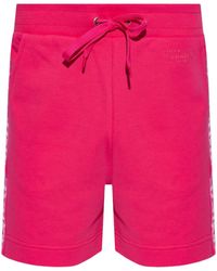 Moschino - Logo-embossed Cotton Beach Shorts - Lyst