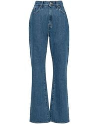 Axel Arigato - Ryder Flared Jeans Solid - Lyst