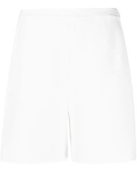 Calvin Klein - Shorts al ginocchio - Lyst