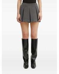 WRSTBHVR - Madden Pleated Mini Skirt - Lyst