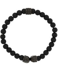 Northskull Pulsera mediana con charms de calavera - Negro